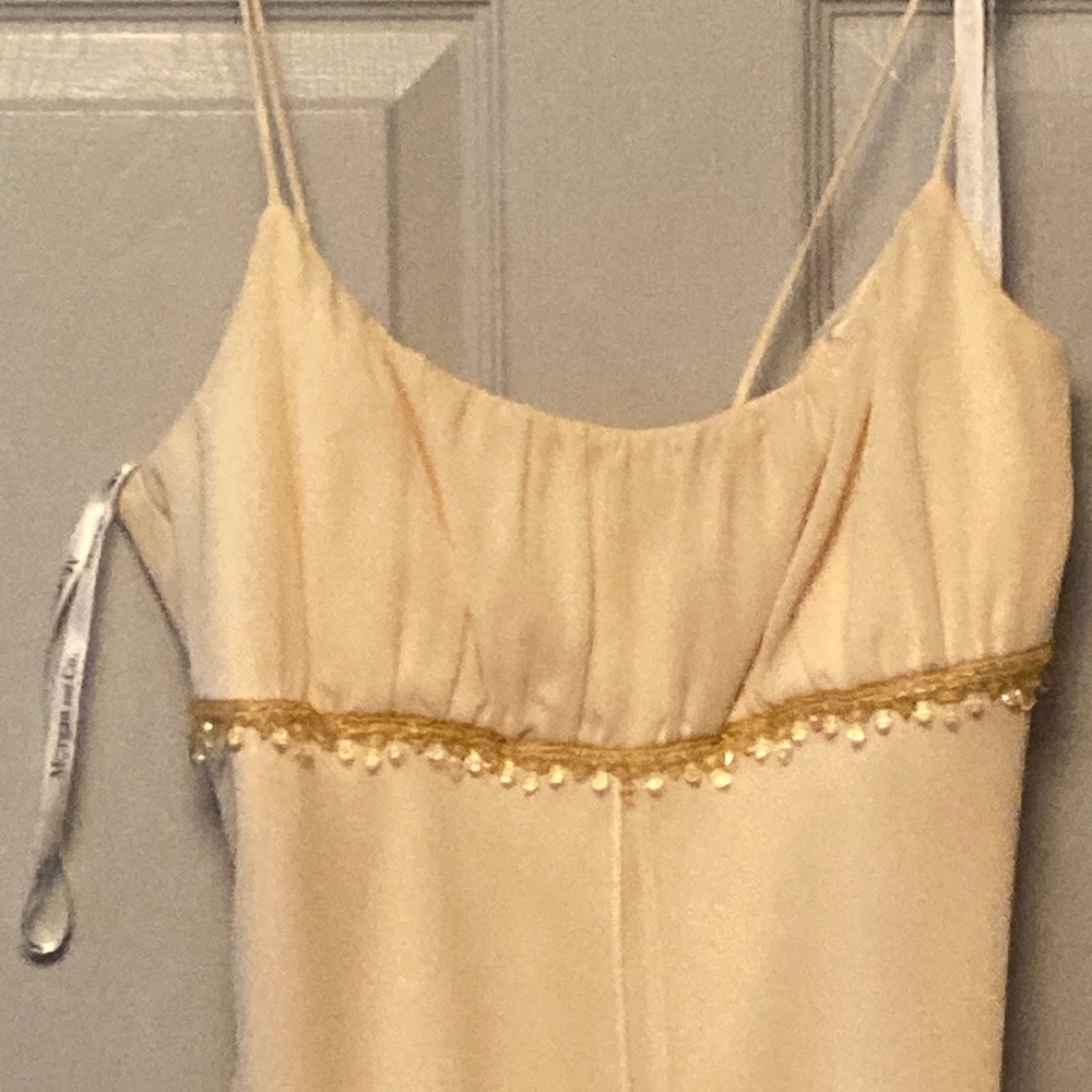 Long yellow simple dress.